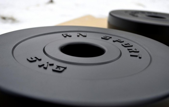 67 кг (2х1.25, 2х2.5, 2x5, 2х10 и 2x15) дисков, покрытых пластиком (31 мм)