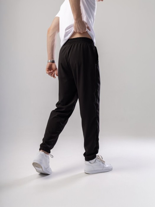 Черные джогера для мужчин. Мужские демисезонные легкие брюки джогеры Pobedov Savaya