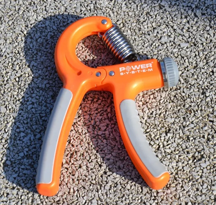 Эспандер кистевой Power System PS-4021 с регулируемой нагрузкой 10-40 кг. Power Hand Grip Orange