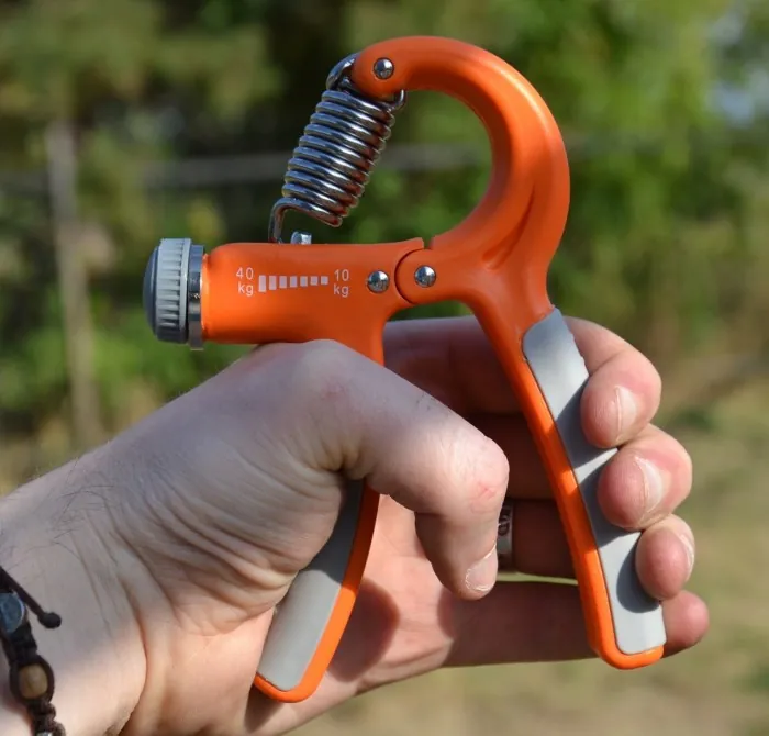 Эспандер кистевой Power System PS-4021 с регулируемой нагрузкой 10-40 кг. Power Hand Grip Orange