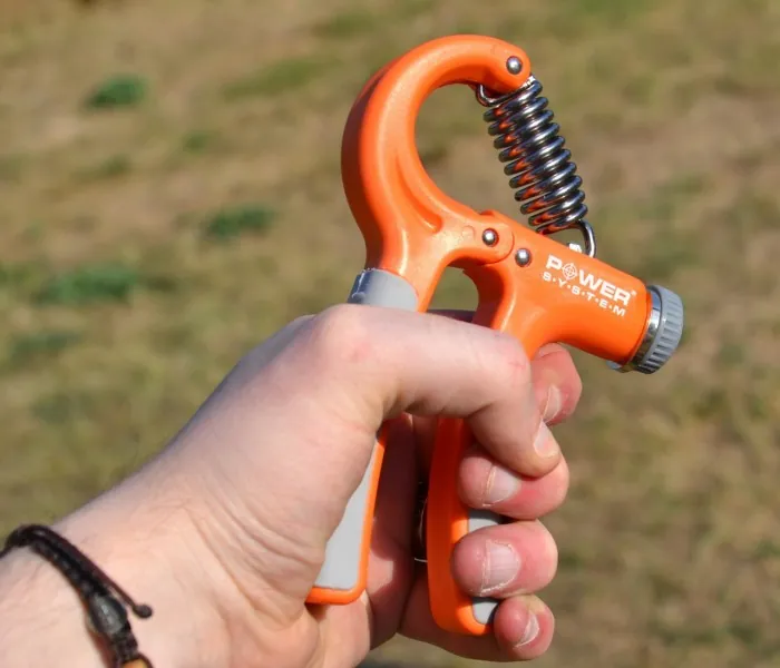 Эспандер кистевой Power System PS-4021 с регулируемой нагрузкой 10-40 кг. Power Hand Grip Orange