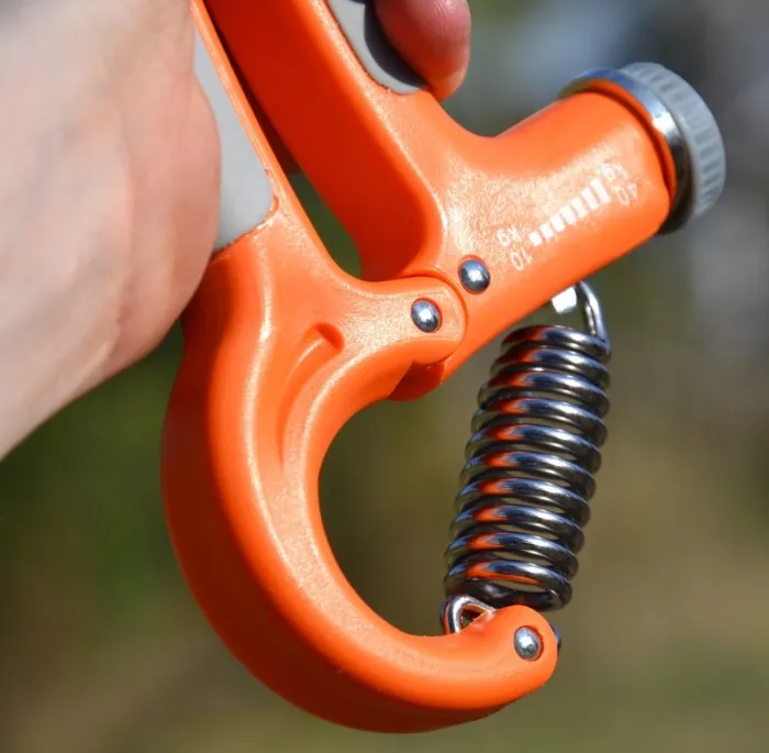 Эспандер кистевой Power System PS-4021 с регулируемой нагрузкой 10-40 кг. Power Hand Grip Orange