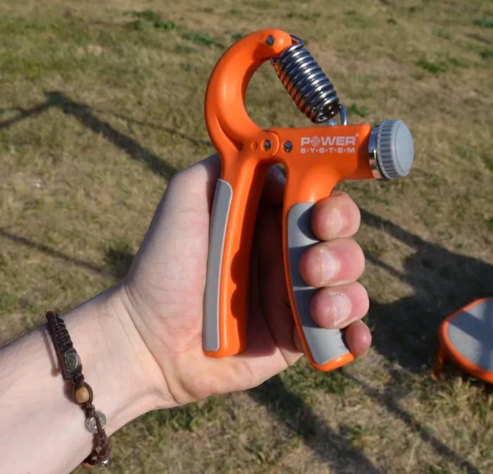 Эспандер кистевой Power System PS-4021 с регулируемой нагрузкой 10-40 кг. Power Hand Grip Orange