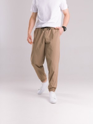 Чоловічі штани джогери з плащівки бежеві з кишенями Pobedov Ground