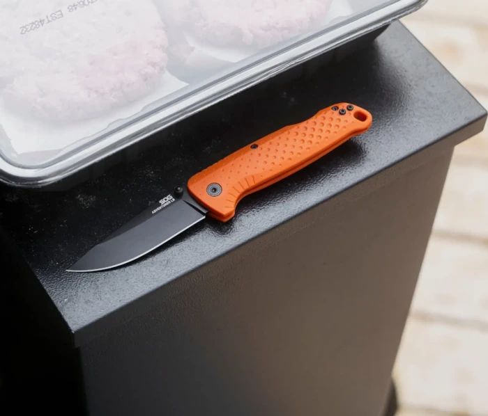 Раскладной нож SOG Adventurer LB, Blaze Orange/Black