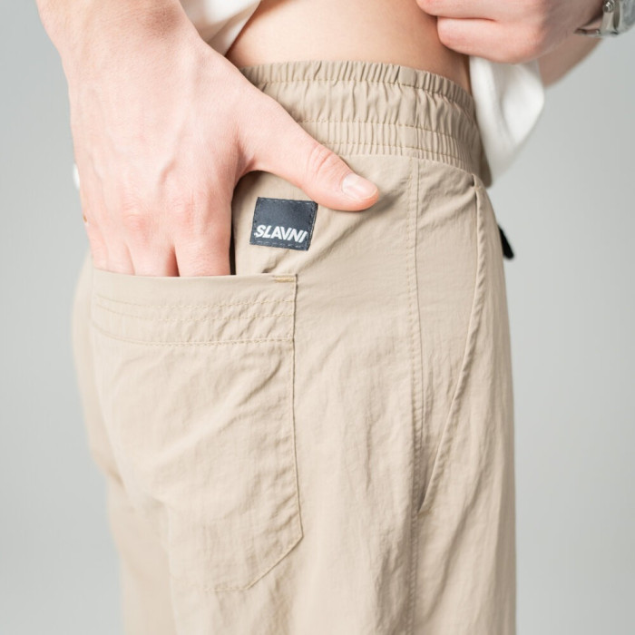 Мужские брюки джогеры из плащевки кремовые с карманами Pobedov Ground