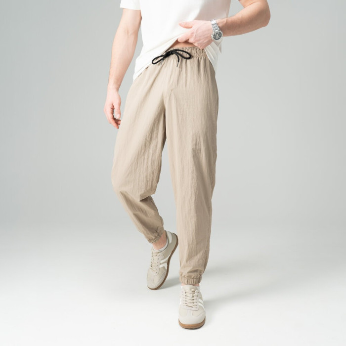 Мужские брюки джогеры из плащевки кремовые с карманами Pobedov Ground